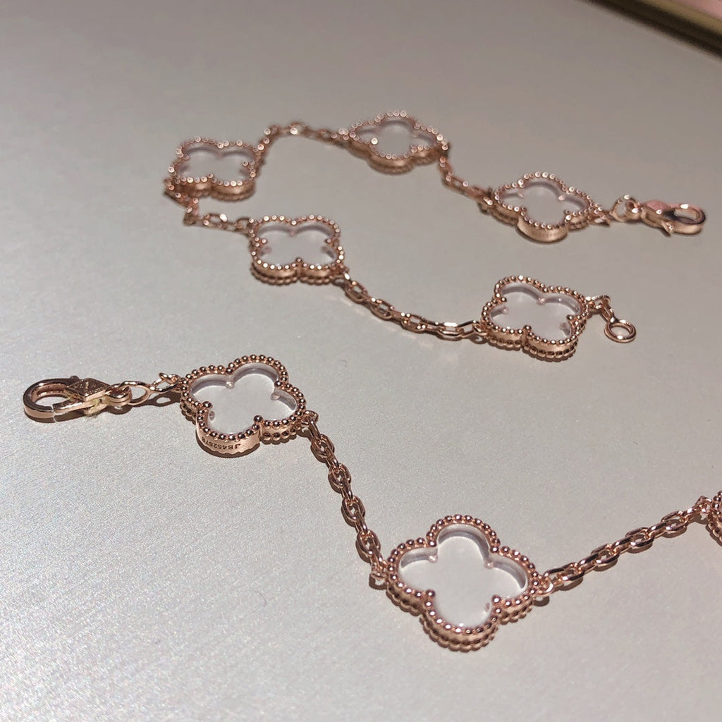 BRACELET EN OR ROSE ET CRISTAL DE ROCHE À 5 MOTIFS TRÈFLE