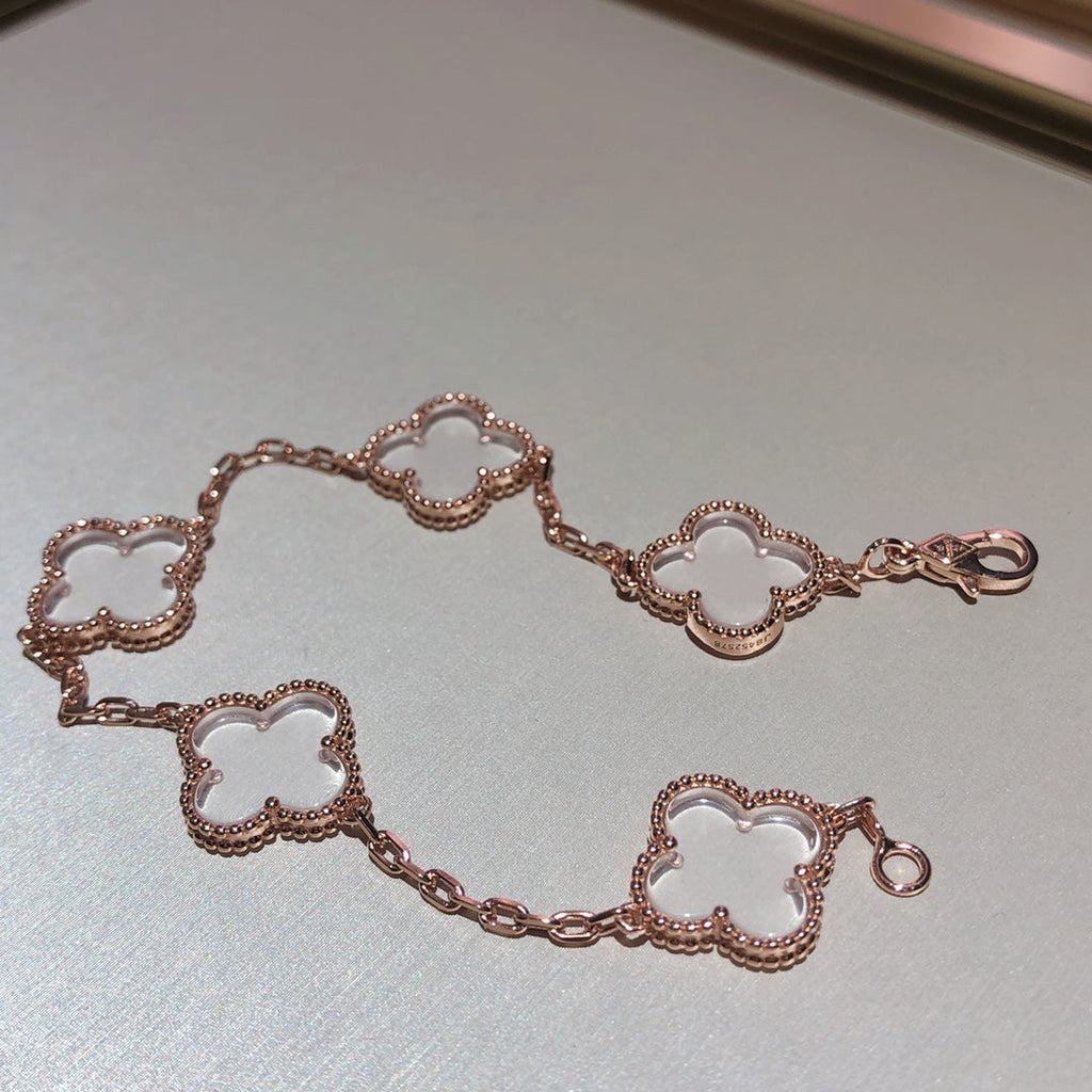 BRACELET EN OR ROSE ET CRISTAL DE ROCHE À 5 MOTIFS TRÈFLE