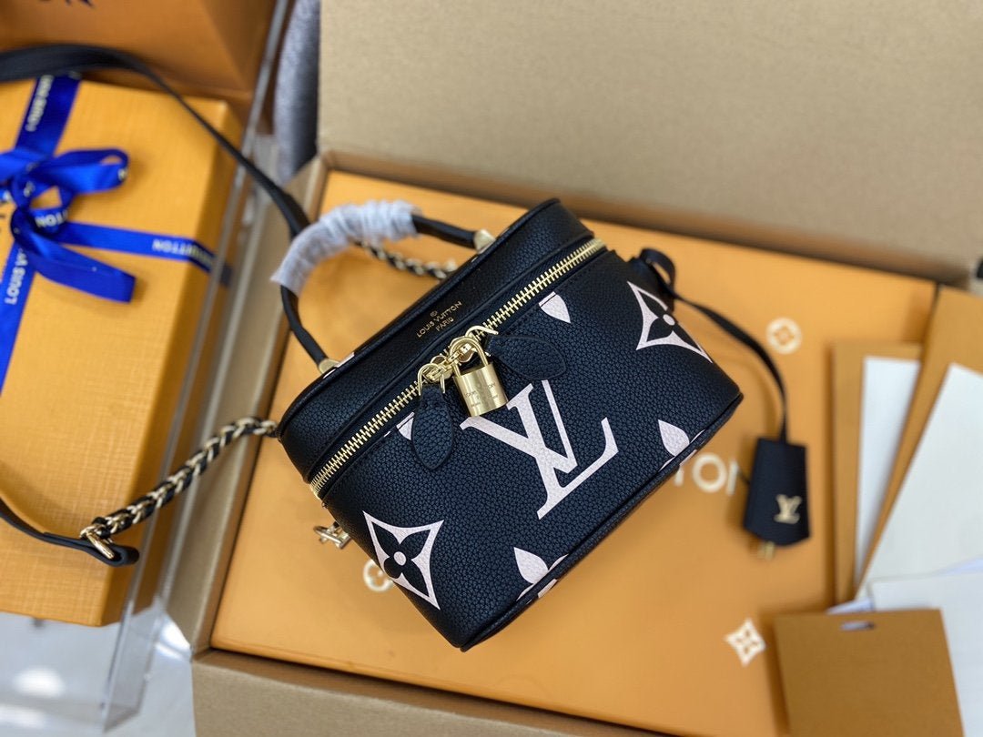 VANITY PM 19 CM NOIR BLANC MONOGRAMME EMPREINTE CUIR 