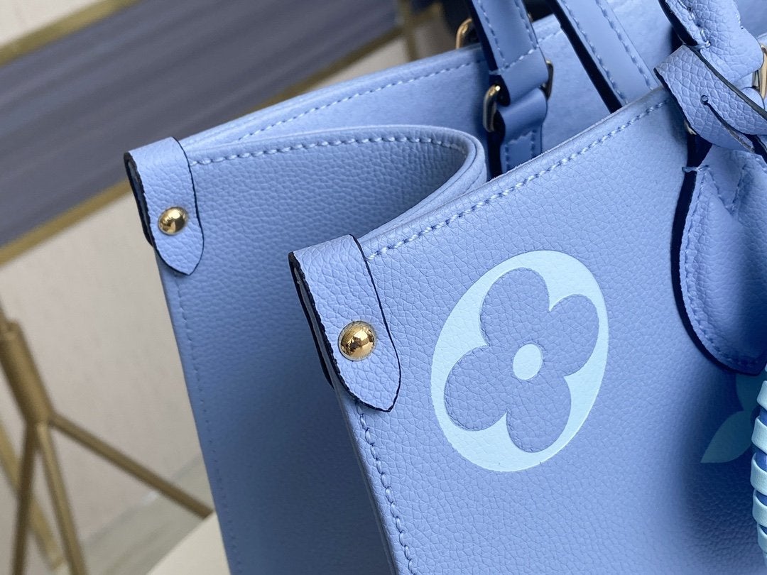 ONTHEGO MM 35CM CUIR DE VACHE GRAINÉ BLEU ÉTÉ 