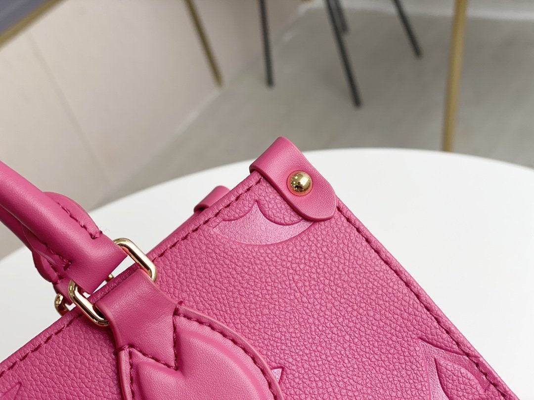ONTHEGO MM 35CM CUIR DE VACHE GRAINÉ ROSE GAUFRÉ