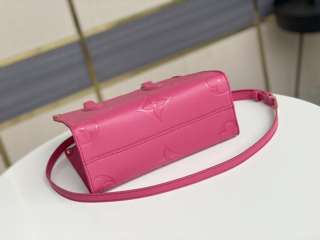 ONTHEGO MM 35CM CUIR DE VACHE GRAINÉ ROSE GAUFRÉ