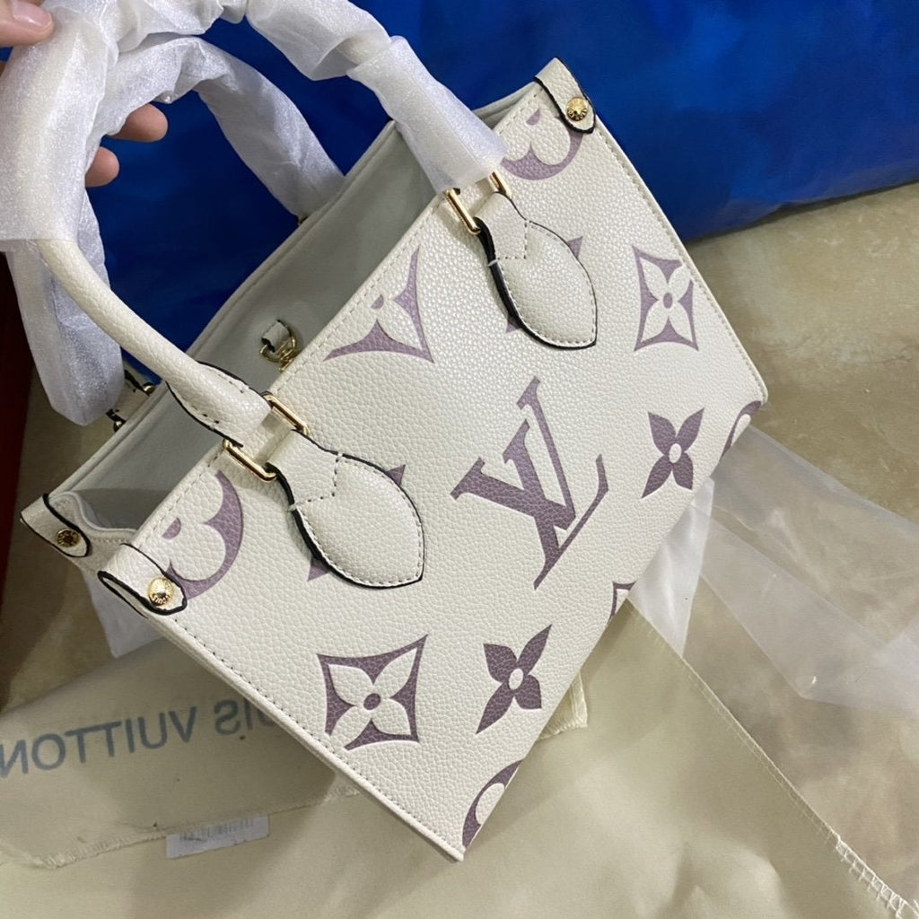 ONTHEGO PM 25 CUIR DE VACHE GRAINÉ GAUFRÉ CRÈME 