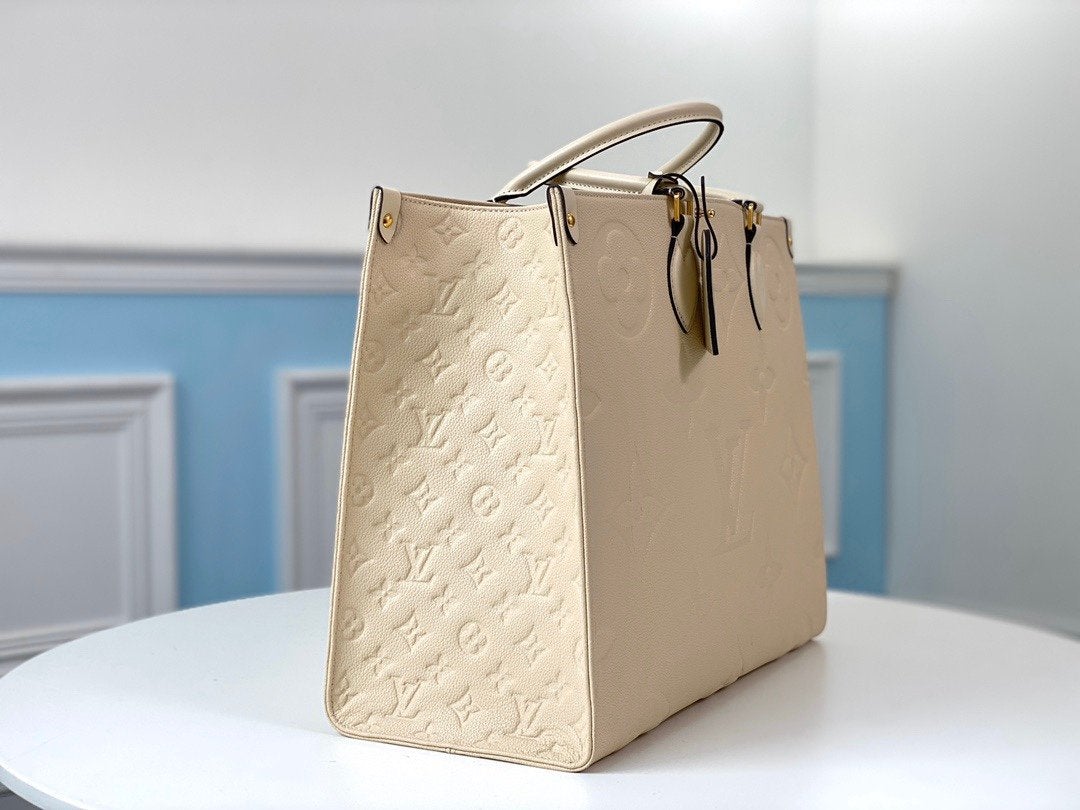 TOILE GÉANTE EMPREINTE MONOGRAMME CRÈME ONTHEGO GM 41