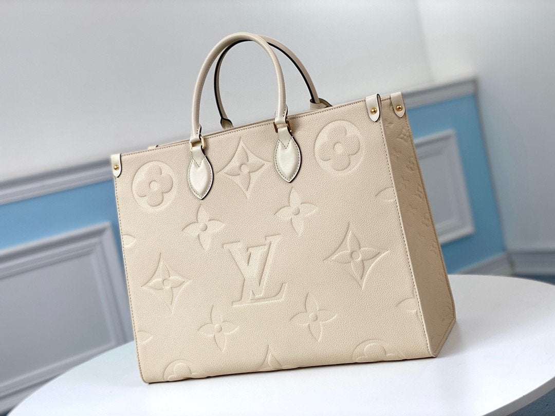 TOILE GÉANTE EMPREINTE MONOGRAMME CRÈME ONTHEGO GM 41