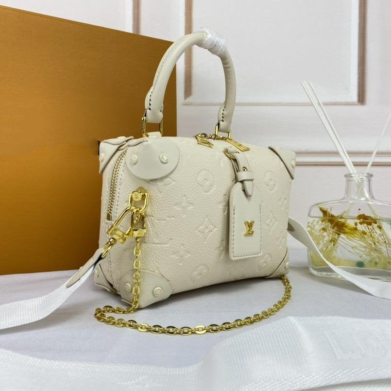 LV PETITE MALLE SOUPLE BLANC MONOGRAMME EMPREINTE
