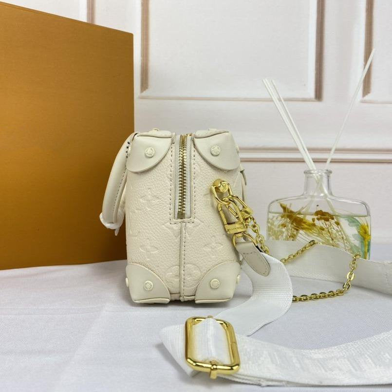 LV PETITE MALLE SOUPLE BLANC MONOGRAMME EMPREINTE