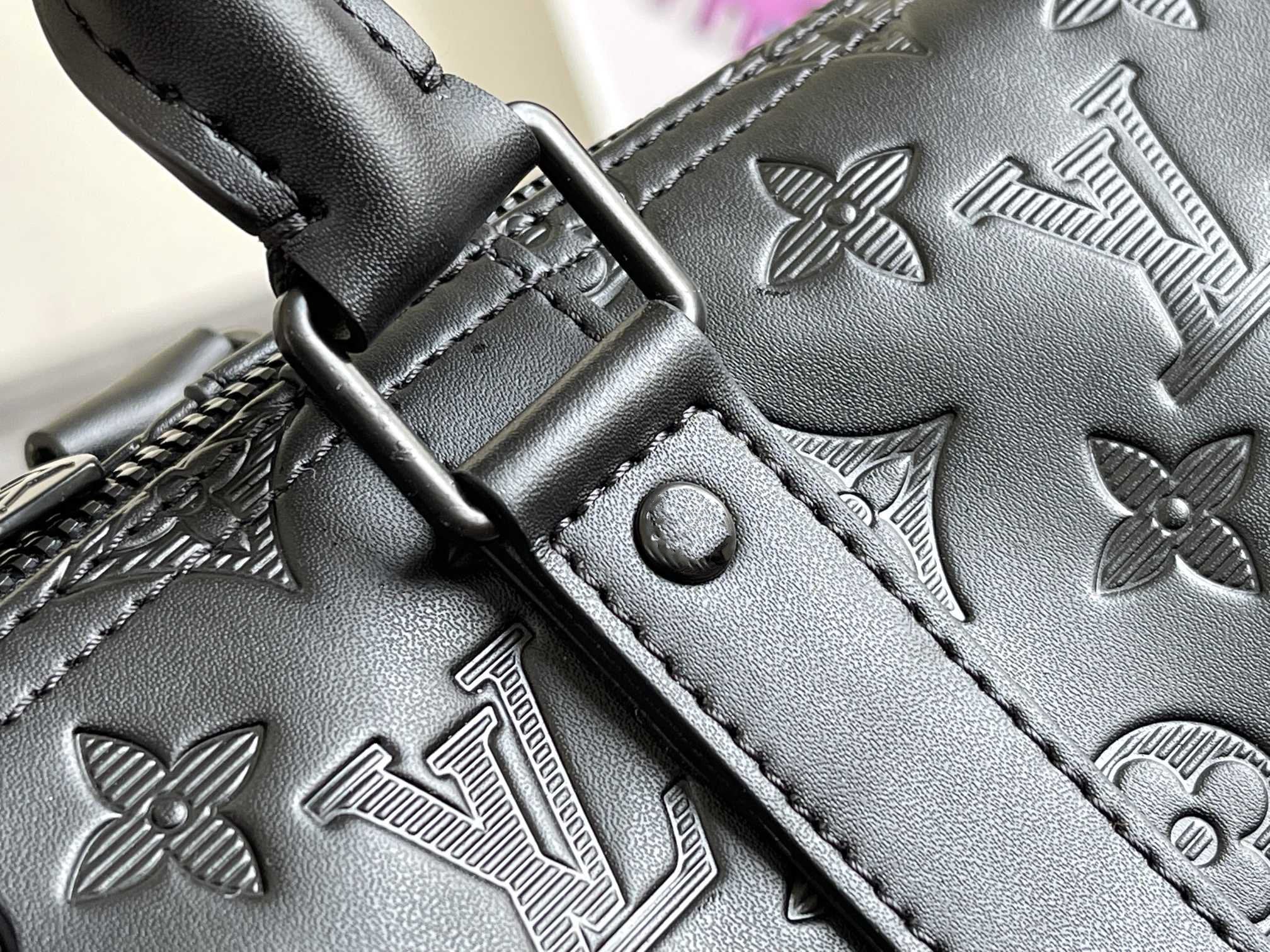 KEEPALL 50 BANDOULIERE CUIR EMPREINTE NOIR