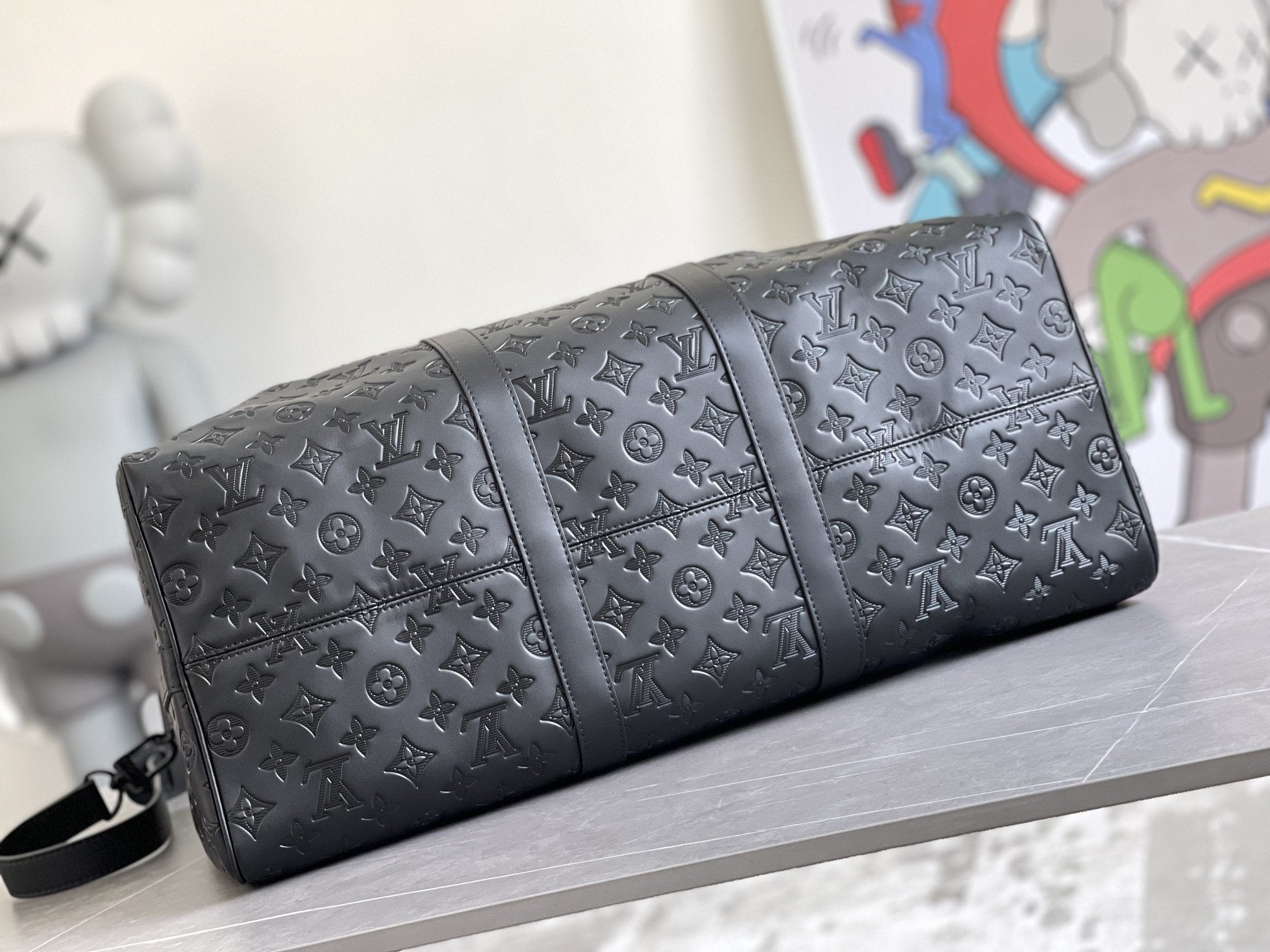 KEEPALL 50 BANDOULIERE CUIR EMPREINTE NOIR