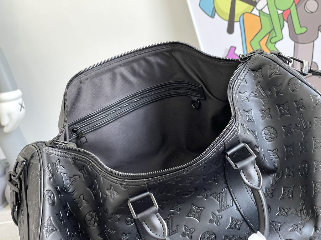 KEEPALL 50 BANDOULIERE CUIR EMPREINTE NOIR
