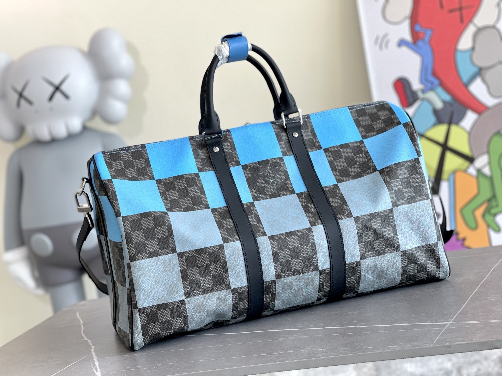 KEEPALL 50 BANDOULIÈRE BLEU DAMIER GRAPHITE 