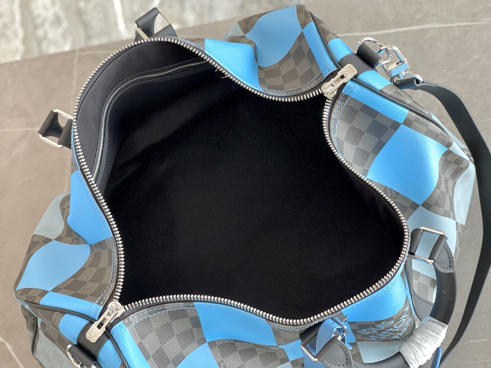 KEEPALL 50 BANDOULIÈRE BLEU DAMIER GRAPHITE 
