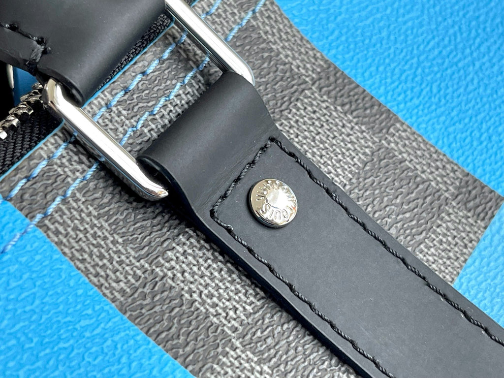KEEPALL 50 BANDOULIÈRE BLEU DAMIER GRAPHITE 