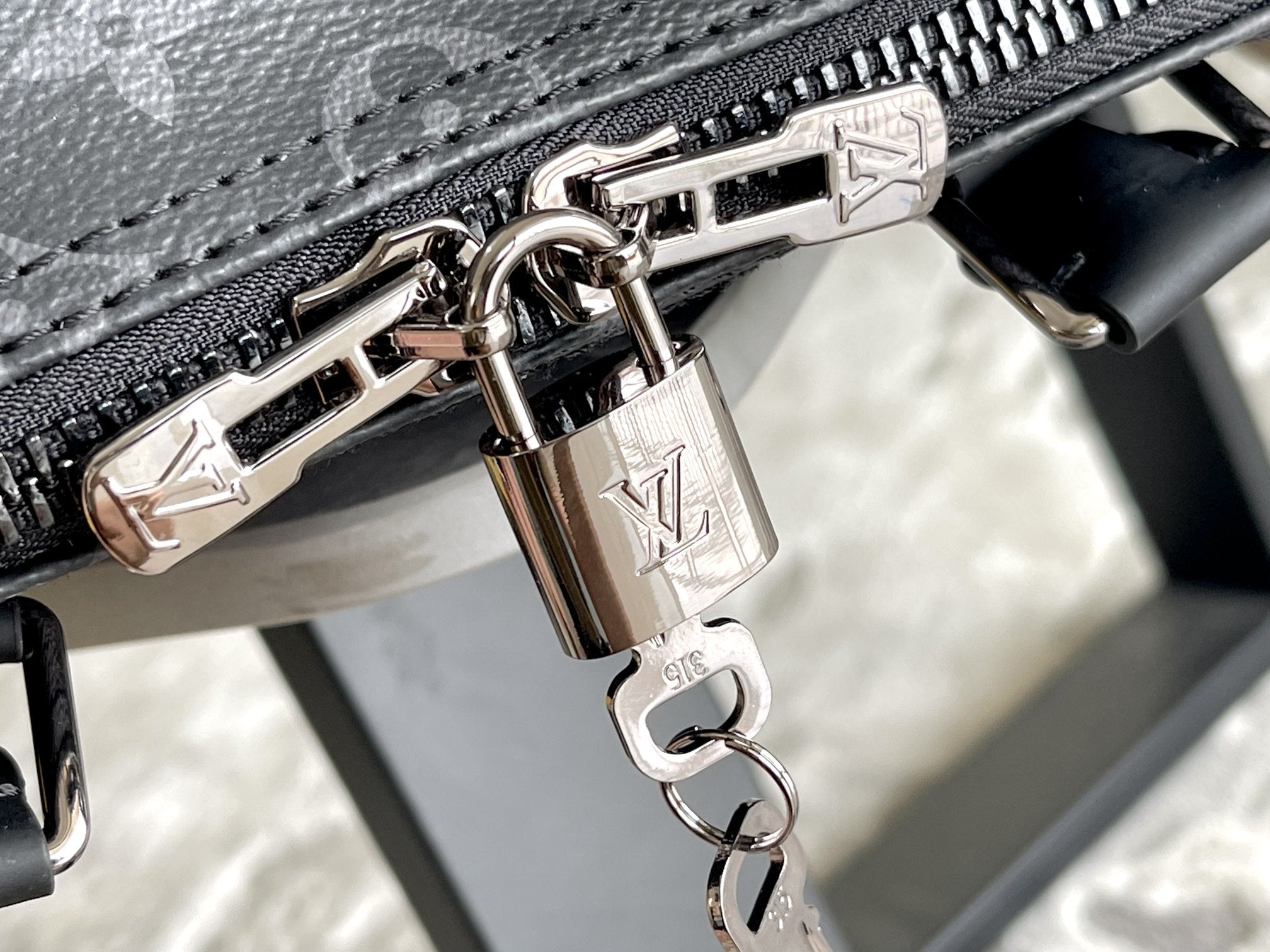 KEEPALL 45 BANDOULIÈRE MONOGRAMME ECLIPSE