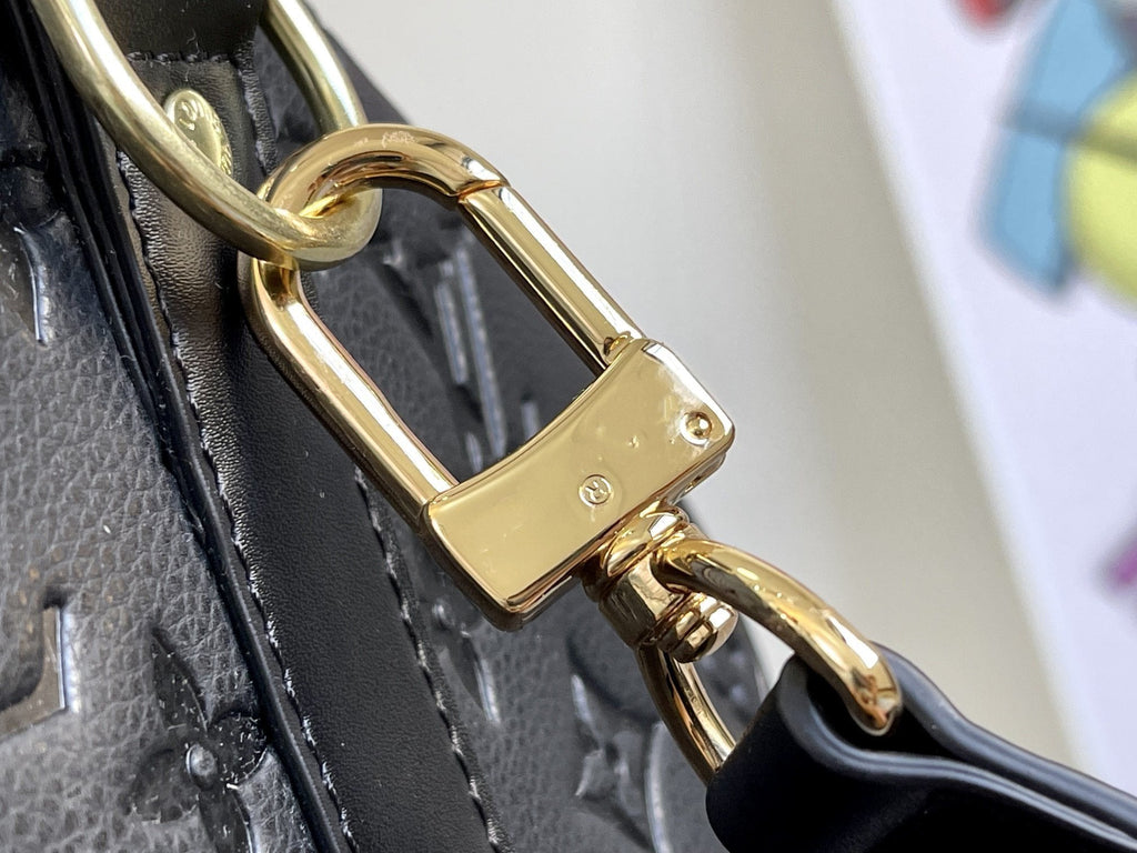 KEEPALL 45 BANDOULIERE MONOGRAMME EMPREINTE GÉANT