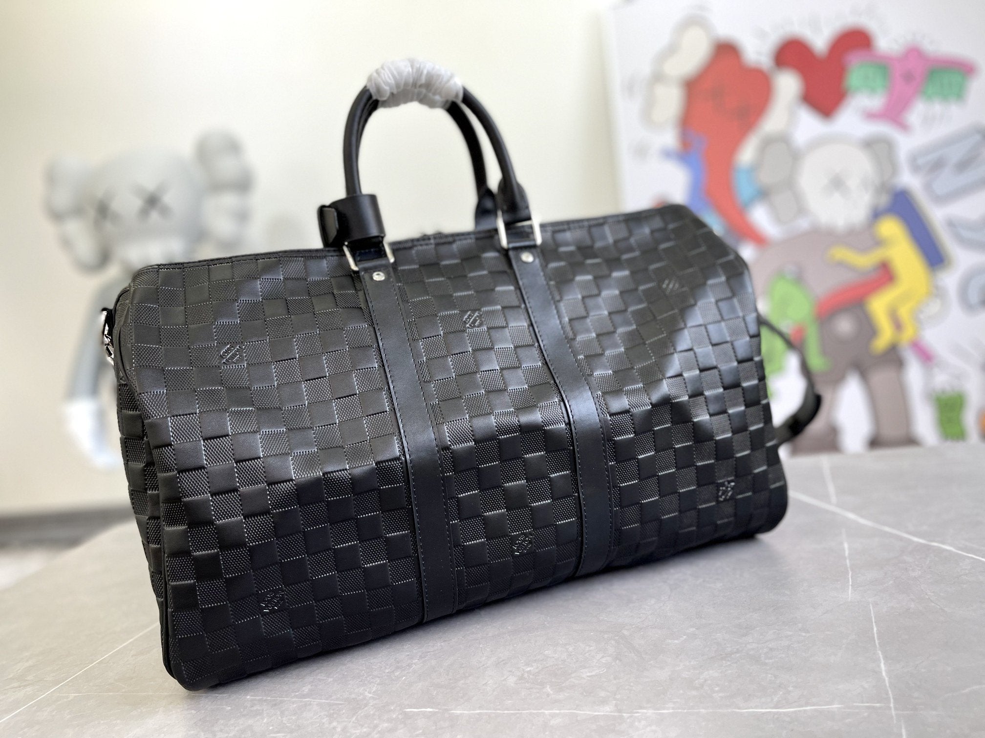 KEEPALL 45 BANDOULIERE NOIR EMPREINTE INFINI 
