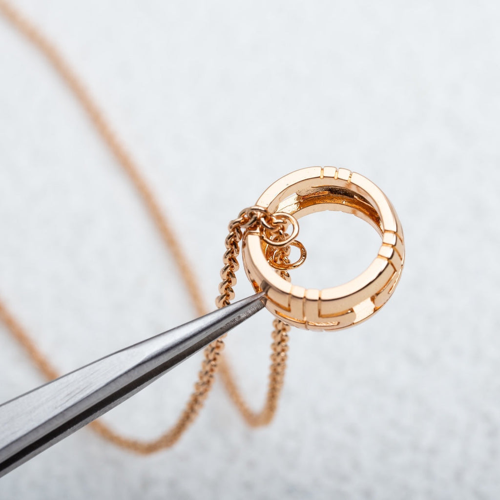 COLLIER PARENTESI OR ROSE