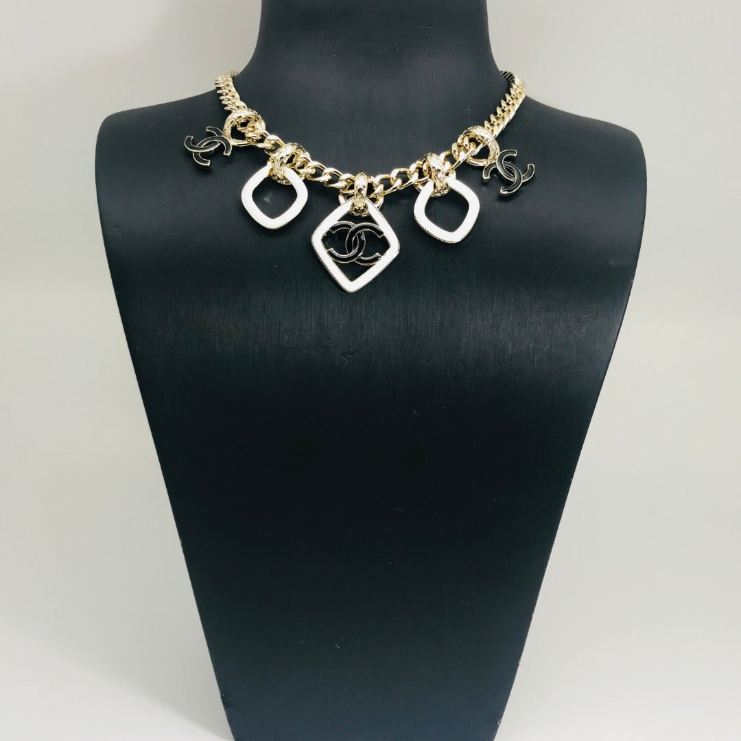 MULTI CHARM ROSE GOLD  BLACK ENAMEL NECKLACE
