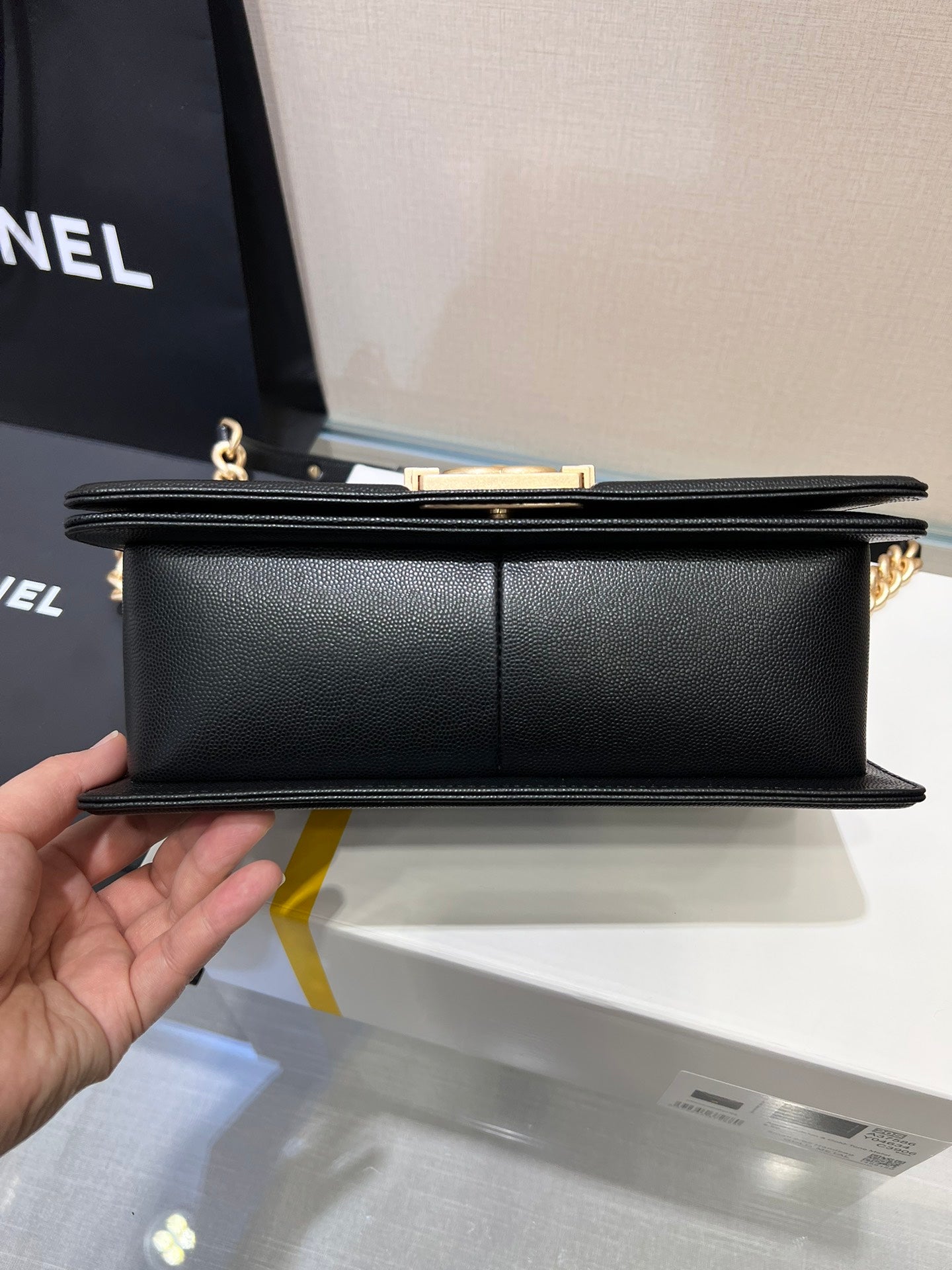 SAC GARÇON MOYEN 25 NOIR CAVIAR QUINCAILLERIE OR
