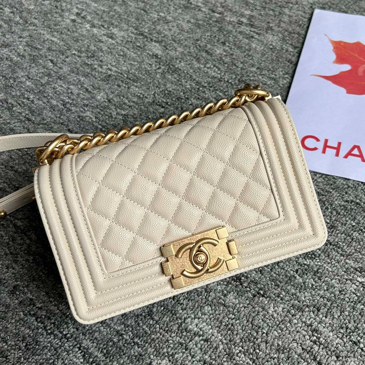 SAC GARÇON PETIT 20 CRÈME CAVIAR QUINCAILLERIE OR