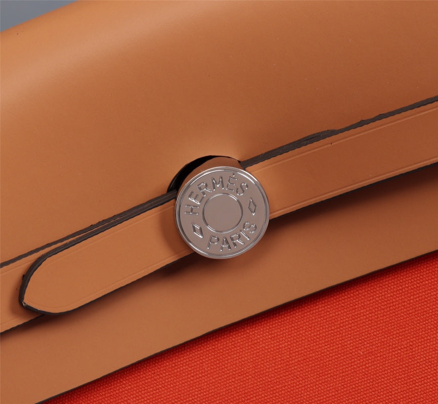 HM HERBAG ZIP 31 TOILE ROUGE ORANGE ET CUIVRE