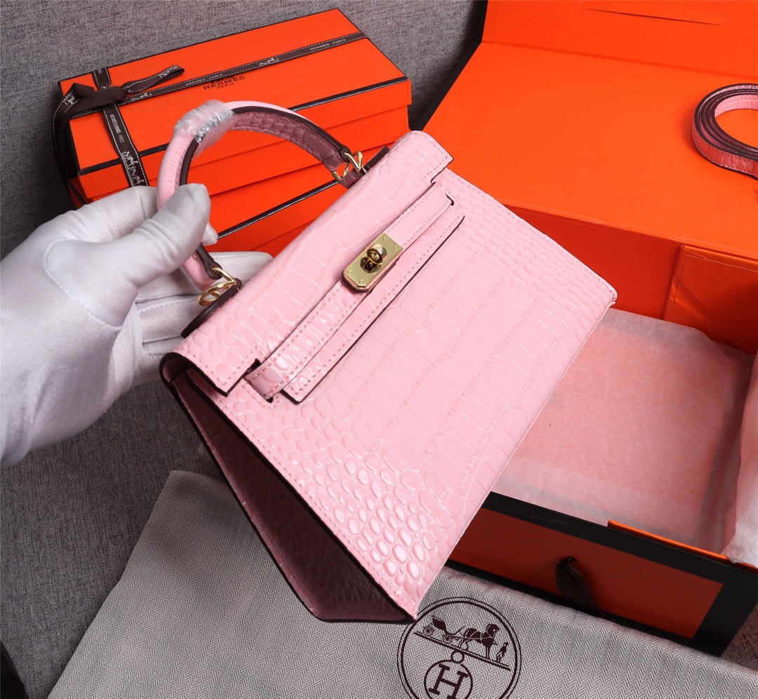 HM KELLY MINI 22 CUIR DE VEAU ROSE CLAIR GAUFRÉ QUINCAILLERIE DORÉ