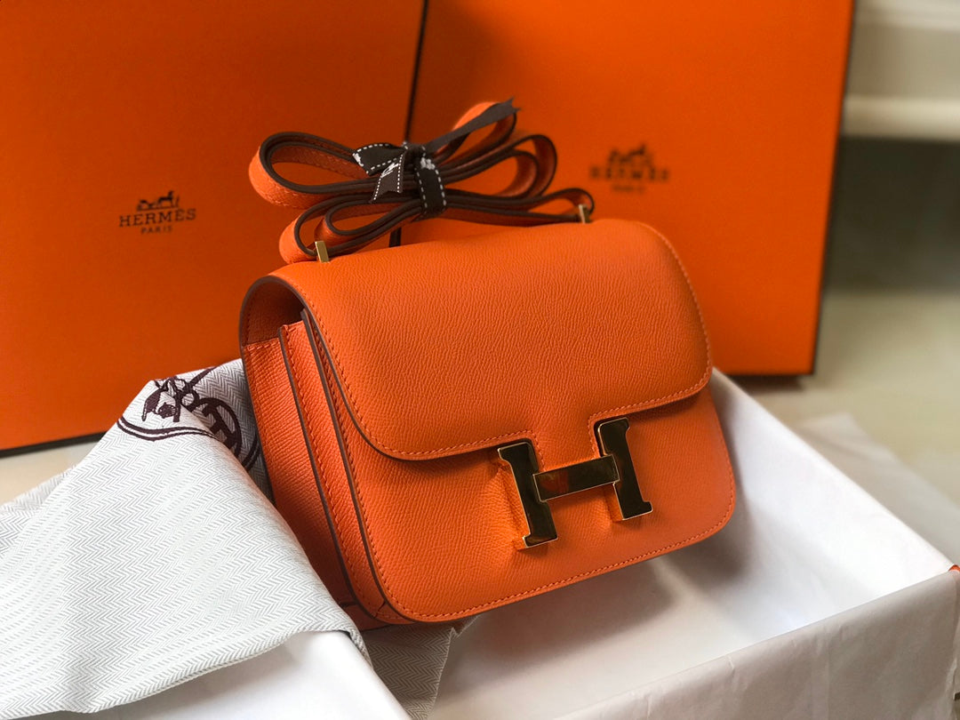 CONSTANCE 18 ORANGE EPSOM QUINCAILLERIE OR