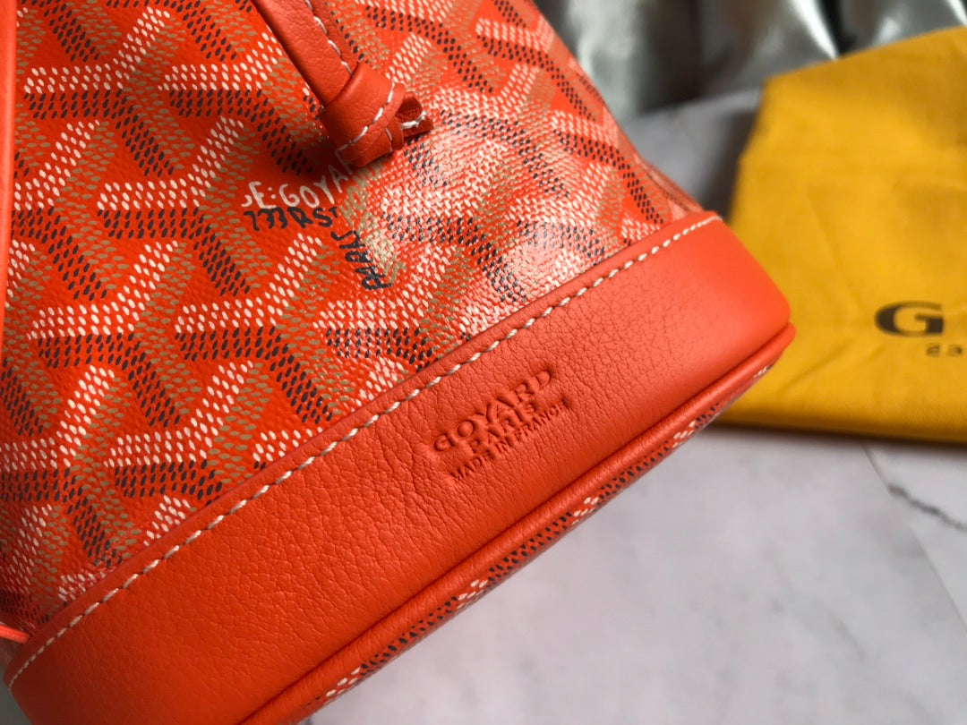 SAC SEAU PETIT FLOT 22 EN TOILE GOYARDINE ORANGE ET GARNITURE AGNEAU