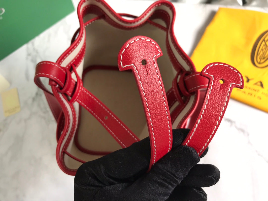 SAC SEAU PETIT FLOT 22 EN TOILE GOYARDINE ROUGE CLASSIQUE ET BORDURE EN CUIR D'AGNEAU