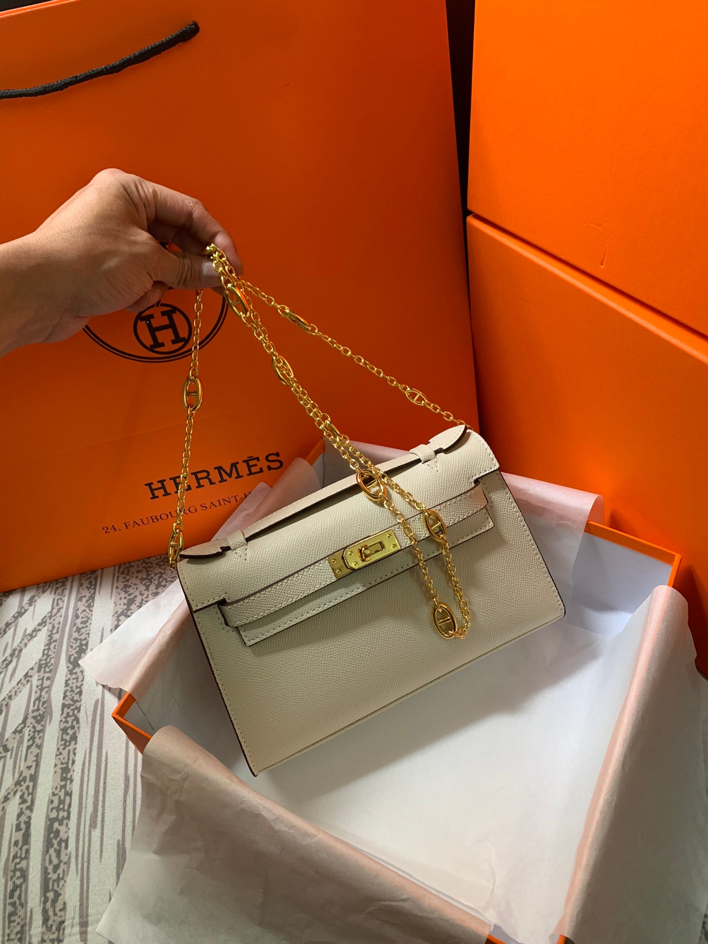 HM KELLY MINI POCHETTE 22 CRÈME EPSOM
