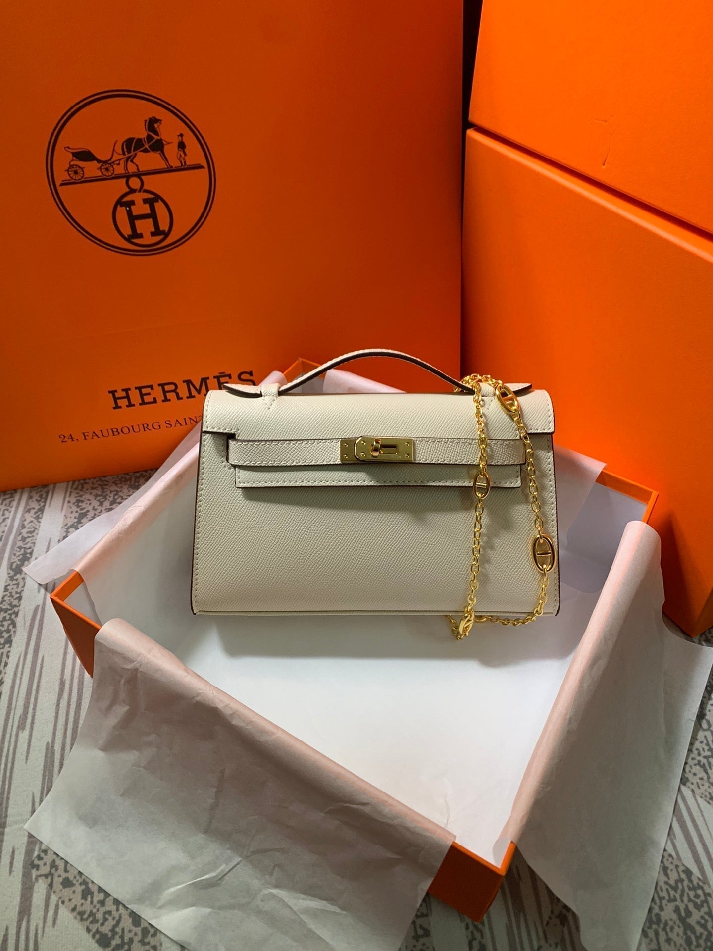HM KELLY MINI POCHETTE 22 CRÈME EPSOM