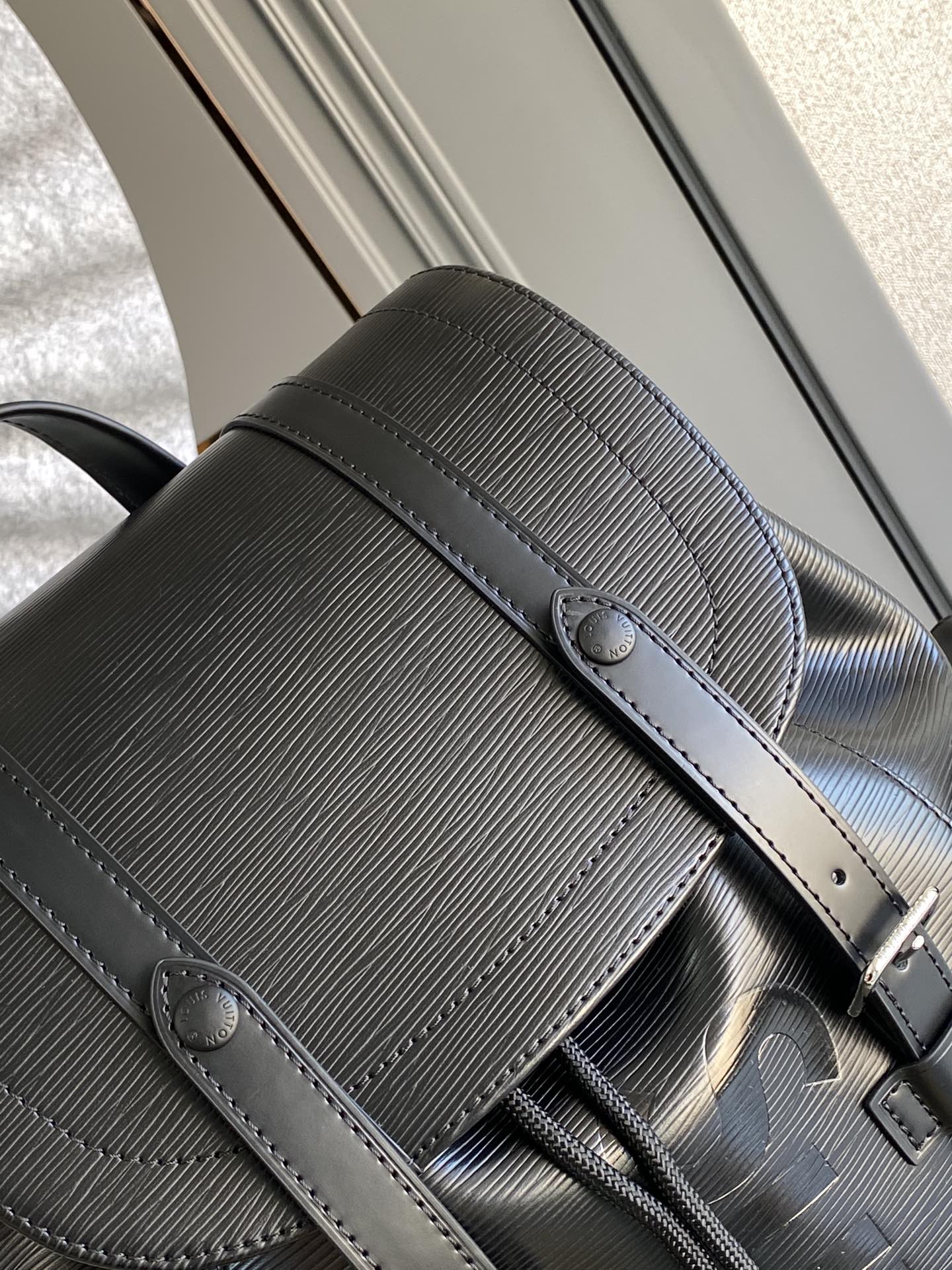 LV X SUPREME CHRISTOPHER SMALL BACKPACK 47 IN BLACK EPI CALFSKIN