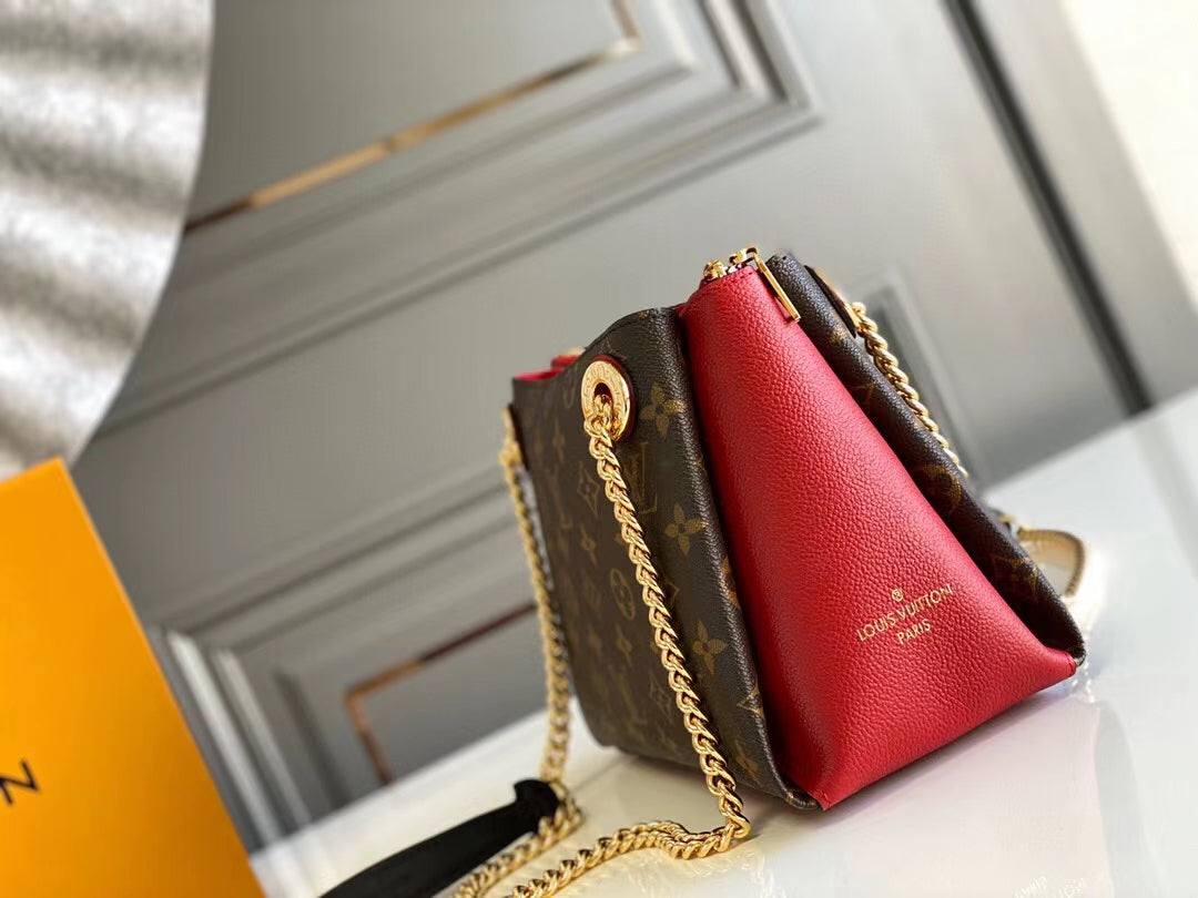 SAC À BANDOULIÈRE CHAÎNE SURENE BB 24 CM EN TOILE MONOGRAMME ET CUIR DE VEAU ROUGE