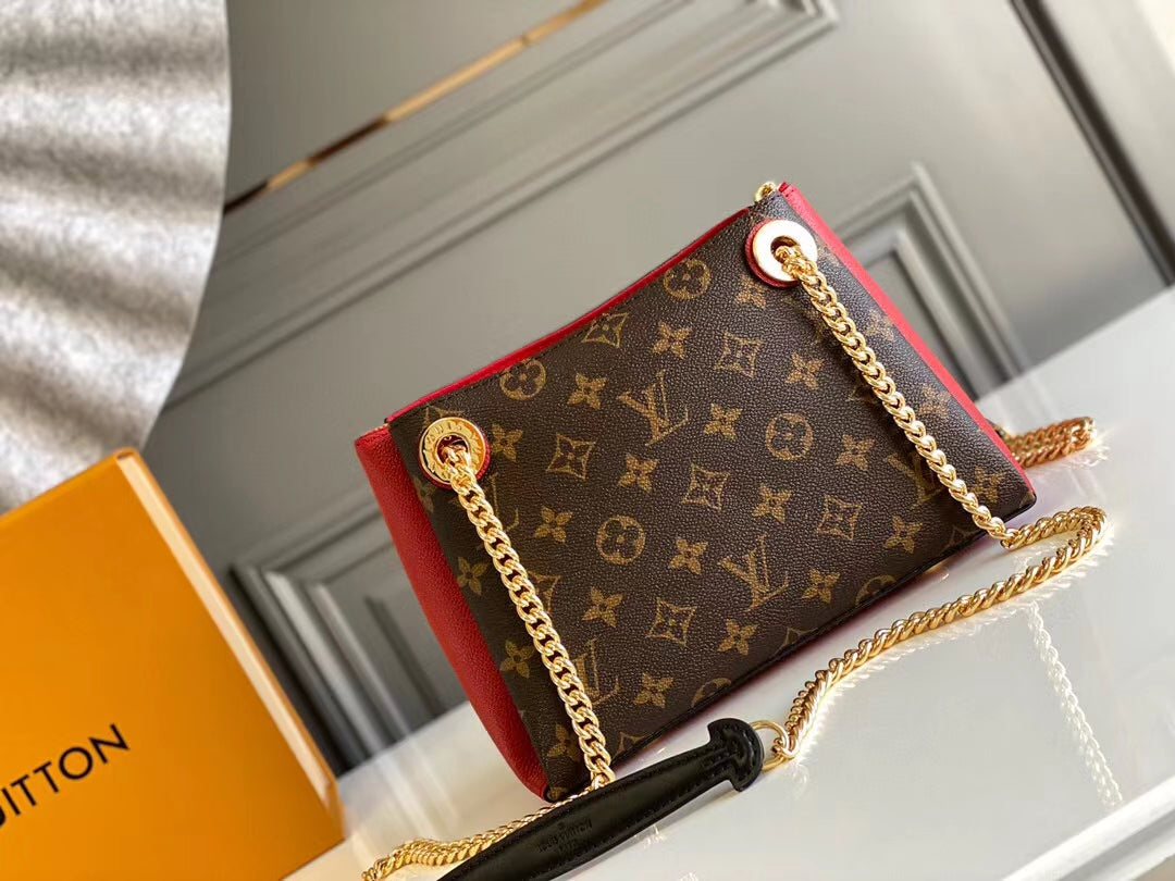 SAC À BANDOULIÈRE CHAÎNE SURENE BB 24 CM EN TOILE MONOGRAMME ET CUIR DE VEAU ROUGE