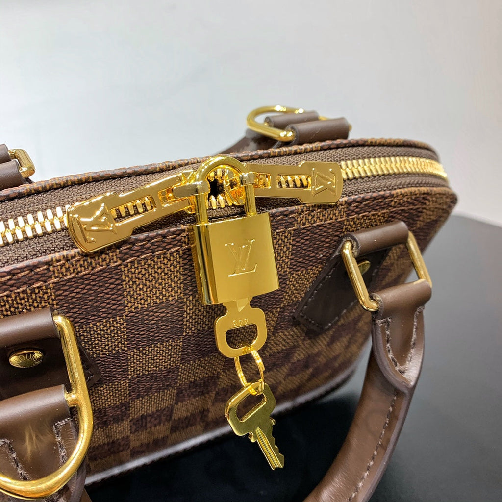 ALMA BB 23 TRESSÉE EN TOILE DAMIER EBENE MARRON BOUCLE OR