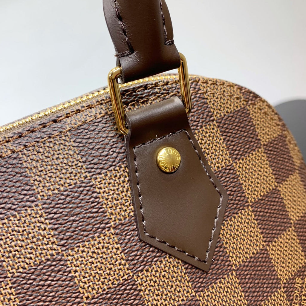 ALMA BB 23 TRESSÉE EN TOILE DAMIER EBENE MARRON BOUCLE OR