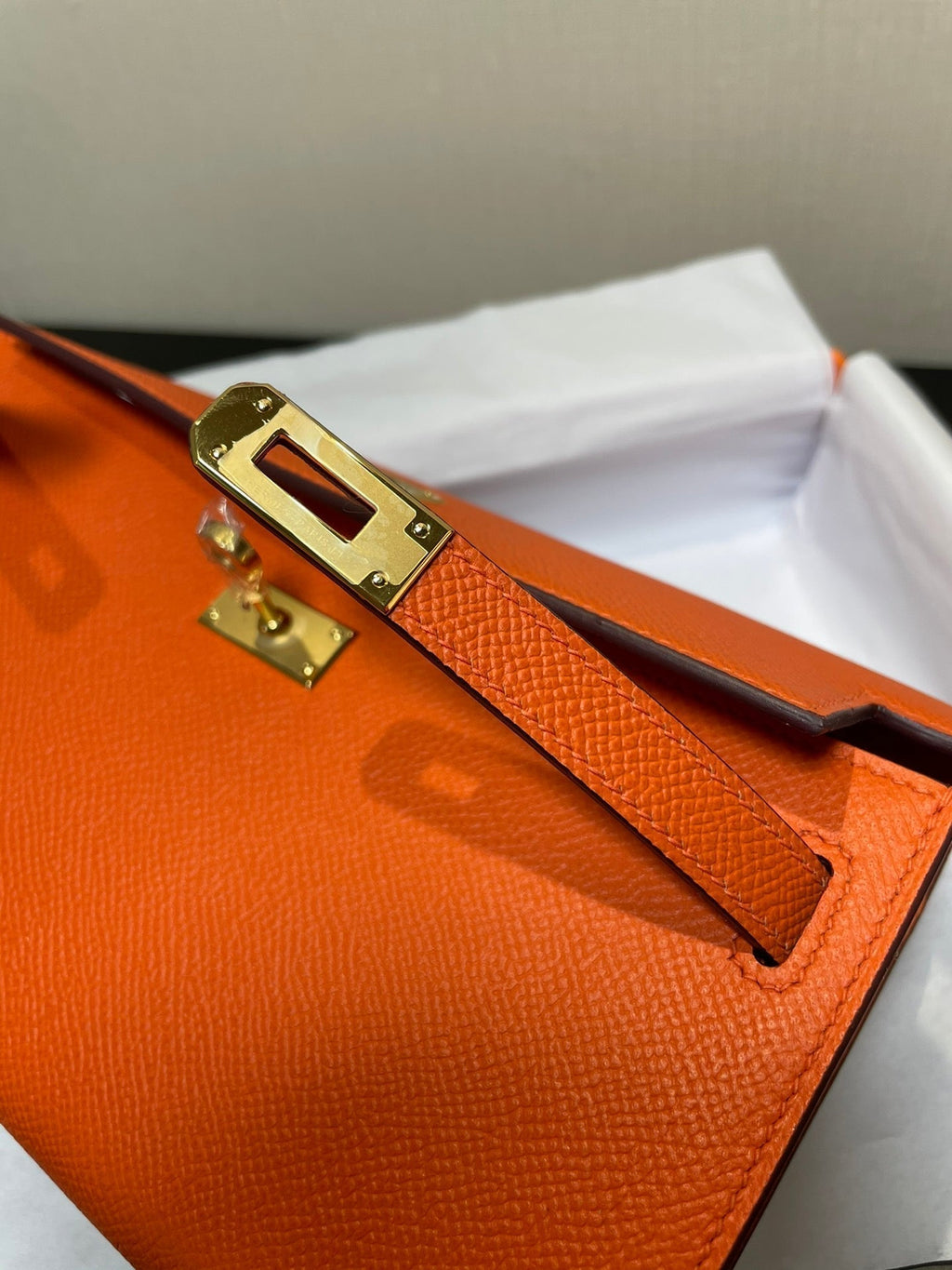 KELLY WOC 20.5 ORANGE EPSOM GOLD HARDWARE
