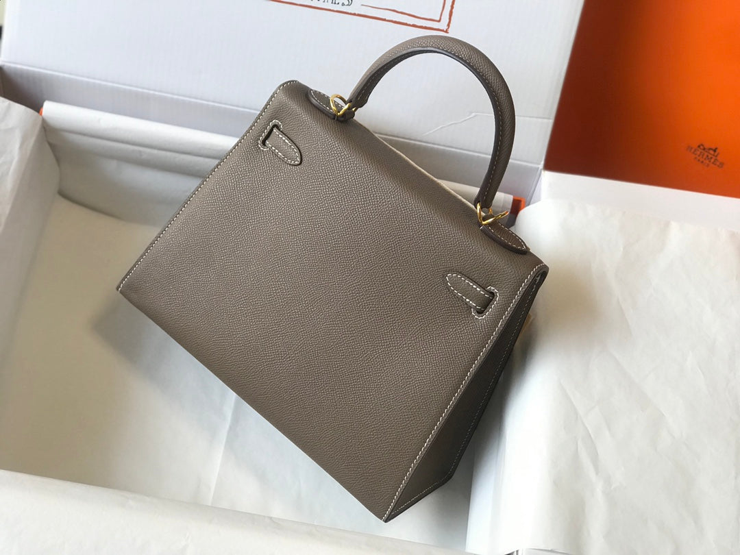 HM KELLY 32CM CUIR EPSOM ÉTAIN QUINCAILLERIE DORÉ