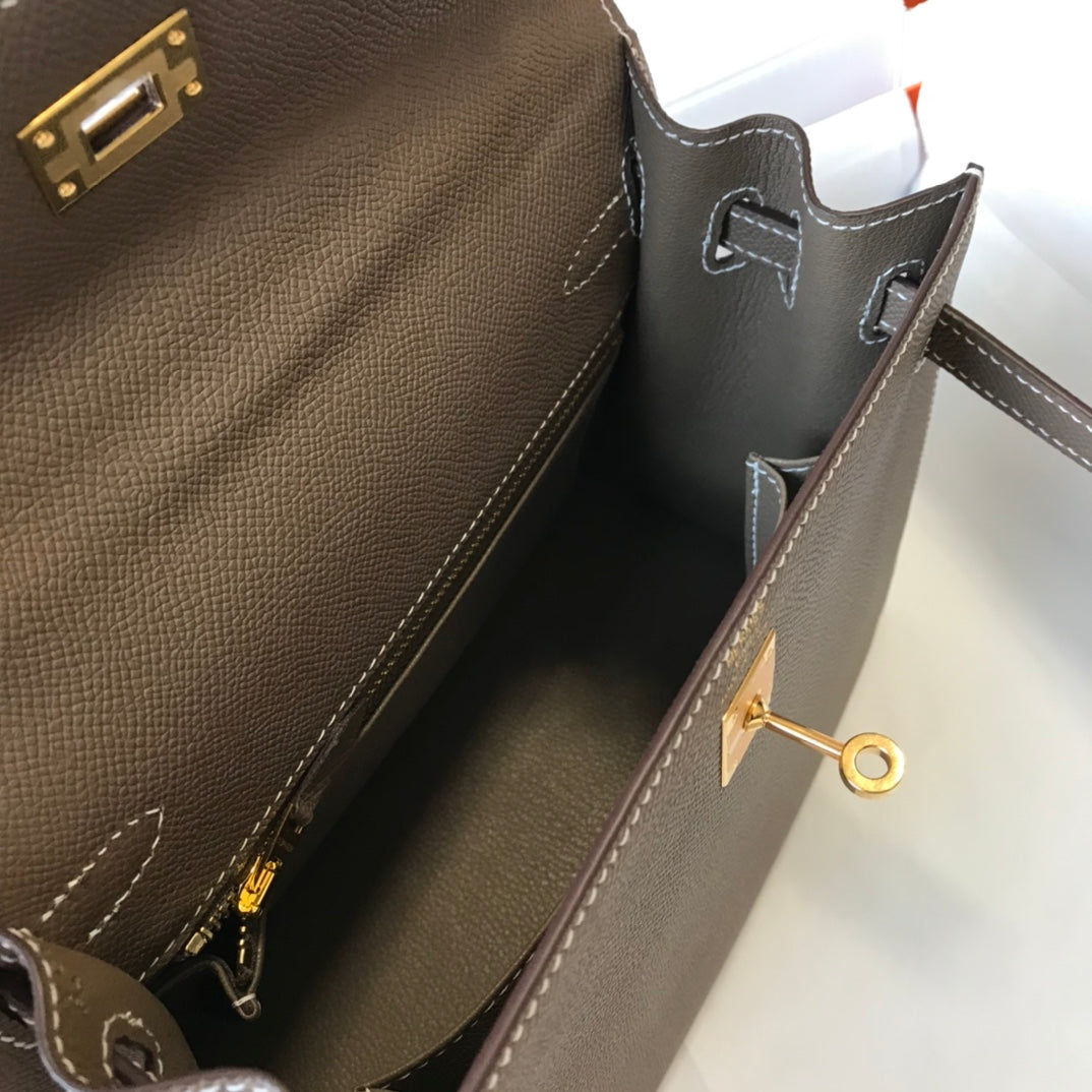 HM KELLY 32CM CUIR EPSOM ÉTAIN QUINCAILLERIE DORÉ