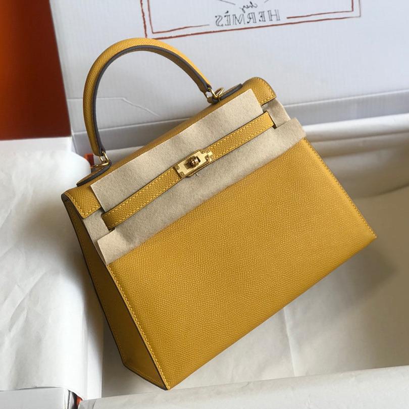 SAC HM KELLY 32 CM EN TOGO JAUNE AVEC QUINCAILLERIE DORÉE