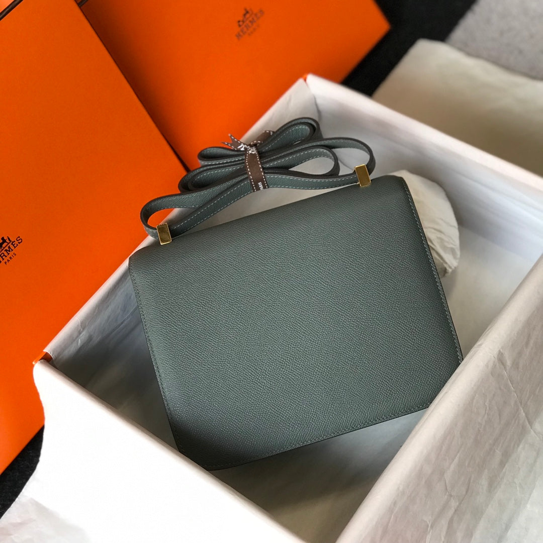 CONSTANCE 24 BLEU ORANGE CUIR EPSOM QUINCAILLERIE OR