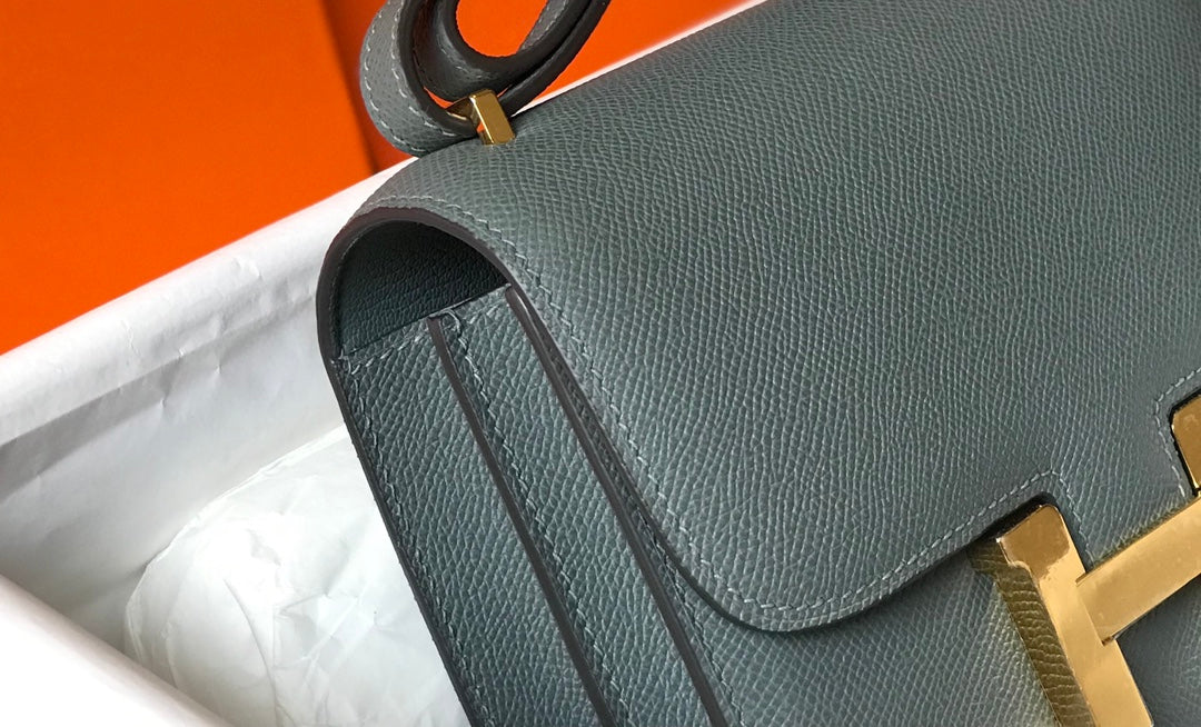 CONSTANCE 24 BLEU ORANGE CUIR EPSOM QUINCAILLERIE OR