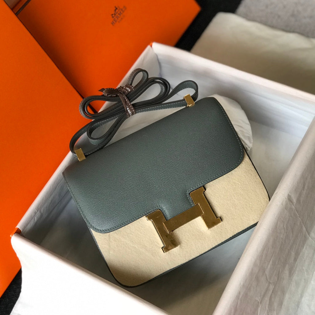 CONSTANCE 24 BLEU ORANGE CUIR EPSOM QUINCAILLERIE OR