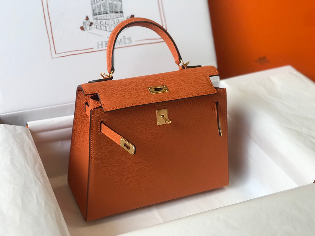 Sac HM Kelly 32 cm en cuir EPSOM orange et matériel doré