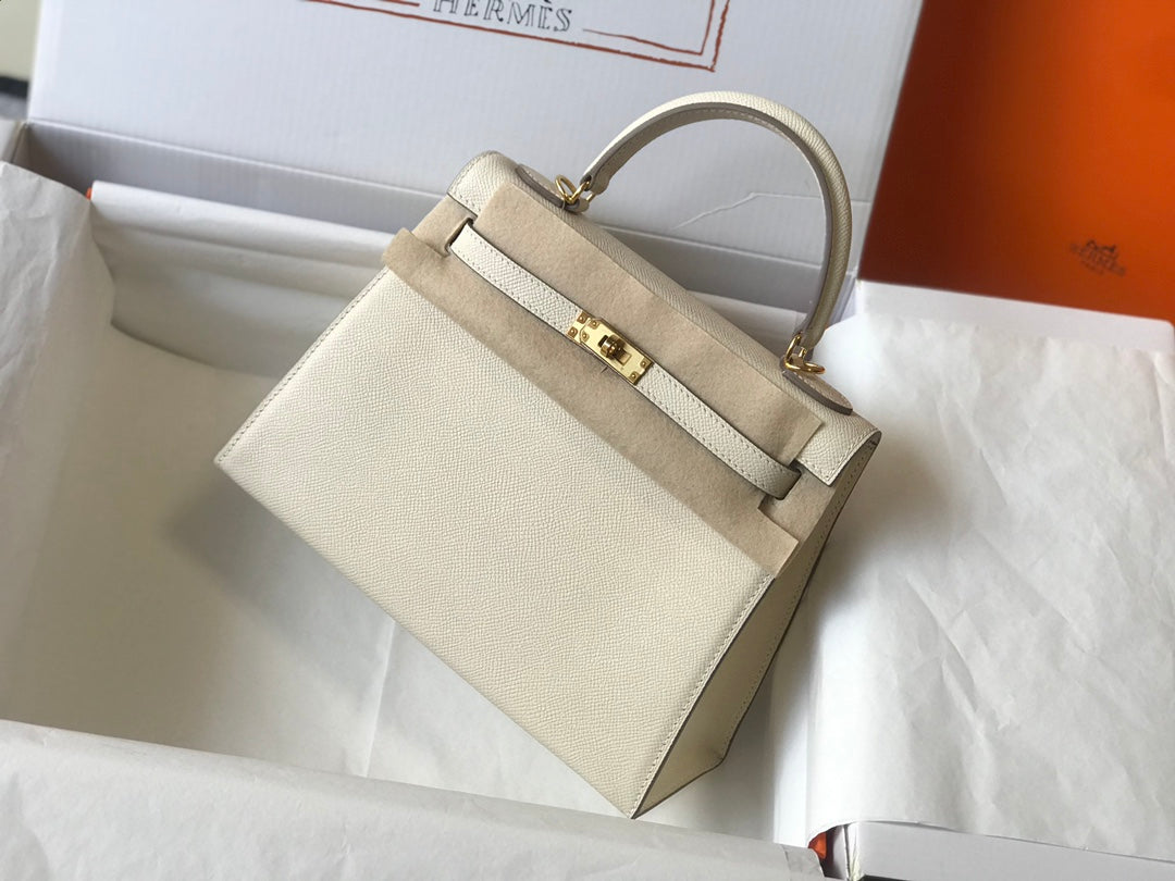 HM KELLY 32CM CUIR EPSOM BLANC QUINCAILLERIE DORÉ