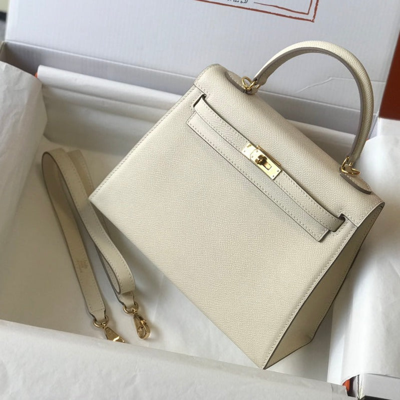 HM KELLY 32CM CUIR EPSOM BLANC QUINCAILLERIE DORÉ