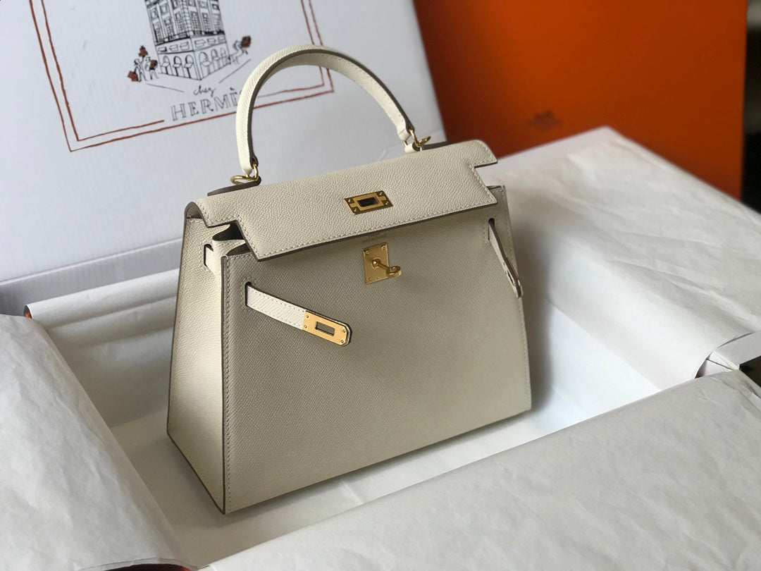 HM KELLY 32CM CUIR EPSOM BLANC QUINCAILLERIE DORÉ