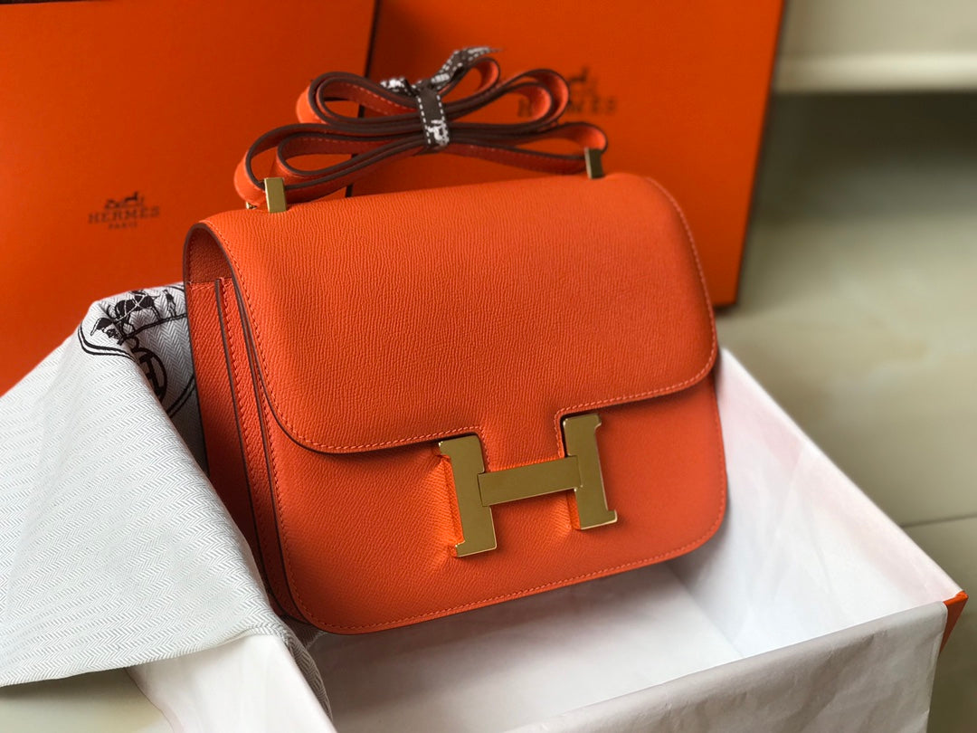 CONSTANCE 24 CUIR EPSOM ORANGE ROUGE QUINCAILLERIE OR