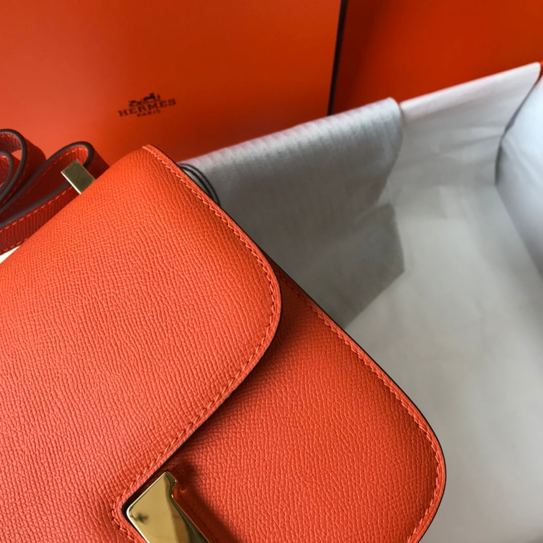 CONSTANCE 24 CUIR EPSOM ORANGE ROUGE QUINCAILLERIE OR