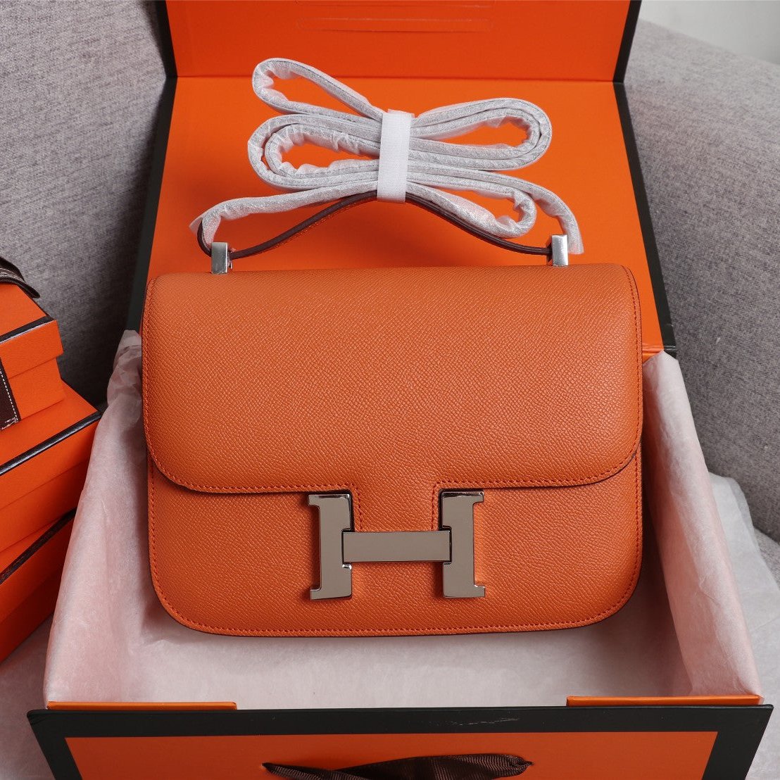 SACS HM CONSTANCE 19 ORANGE EPSOM QUINCAILLERIE ARGENTÉE